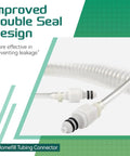 Coiled Homefill tubing connector assembly; white plastic connector with black O-rings, coiled tubing in background.