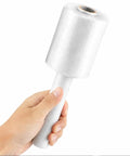Pro Level Mini Stretch Wrap With No Sweat Handle 5 Inch By 1000 Feet 80 Gauge Cast Film 8 Pack held in hand for easy use.