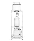Smooth Sippin Cold Brew Drip Coffee Maker With Stainless Filter And Adjustable Flow Yields Barista Style Drinks Via Glass Carafe On Acrylic Stand.