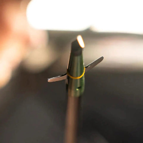 Close-up of 100 Grain Mechanical Broadheads With Two Blade Expandable Design And 2.0 Inch Cutting Diameter Featuring Patented Two Slice Technology.