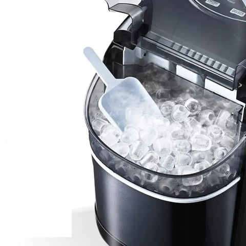 Portable Countertop Ice Maker Electric Machine with cylindrical ice cubes and scoop for drinks in compact design.