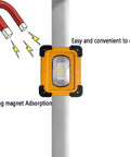 Heavy Duty 60W LED Work Light 15000 Lumens Rechargeable Waterproof Floodlamp with built-in magnetic base mounted on a pole.