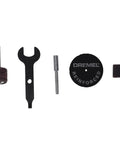 Dremel tool accessories including sanding drum, wrench, and cutting disc for Certified Renewed 12 Volt Cordless Rotary Tool Kit.