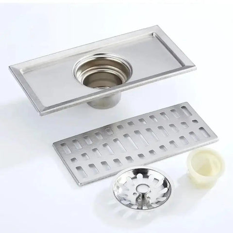 Premium Stainless Steel Rectangular Floor Drain For Bathroom With Massive Flow Deodorant Hair Catcher, showing drain and hair trap.