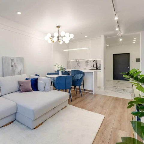 Modern living room with Dope 15W H Type LED Track Light Heads For Accent Lighting And Artwork Adjustable Beam installed on ceiling.