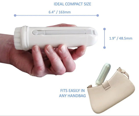 Hand holding Portable Travel Bidet with Dual Pressure Options, 6.4 inch size, shown with handbag for scale.