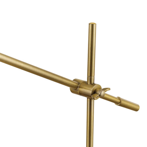 Close-up of the adjustable balance arm of Desk Lamp In Matte Brass Finish With Adjustable Height And Balance Arm Inline Rocker Switch Sleek Modern Vibe Accent Lighting For Home Office Or Workspace Warm Ambient Glow