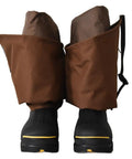 Tough As Nails Beefed Up Steel Toe Rubber Boots With Snake Proof Hip Waders Fully Waterproof Heavy Duty Work Gear, brown chaps and black soles.