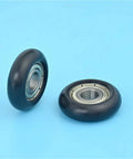 100 Piece Circular Arc Plastic Coated Bearings 688ZZ showing two black plastic coated bearings for doors and windows.