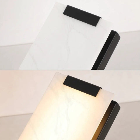 Tipace Hardwired Modern Black LED Wall Sconce Indoor Wall Light Fixture with white marble panel and black accents.