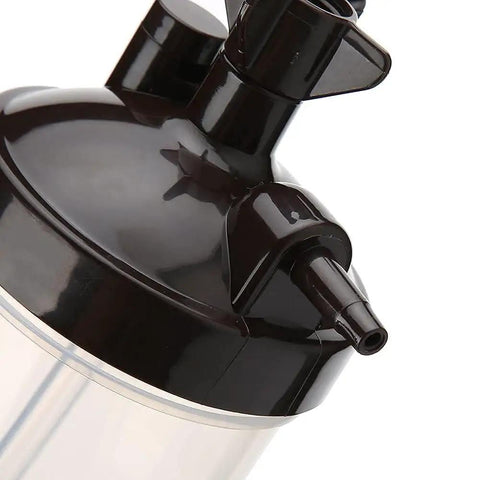Close-up of the Oxygen Humidifier Bubbler Bottle 350ml with built-in pressure relief valve and 12 inch tubing adapter.