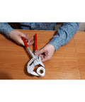 Person using Do It All Pliers Wrench Chrome Finish With Smooth Jaws Replaces Metric And Imperial Spanners Zero Backlash Jaw