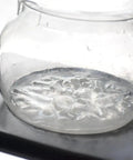 Close-up of a one liter glass vessel from the Premium Handmade Glass And Wooden Cold Brew Coffee Maker.