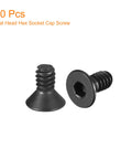 Twenty Piece Top Shelf Five Forty By One Quarter Flat Socket Head Screws With Slick Black Oxide Coating and Dang Tough Grip Made From Hella Strong Ten Point Carbon Steel For Real Daily Wrenching Projects, showing two flat head hex socket cap screws.