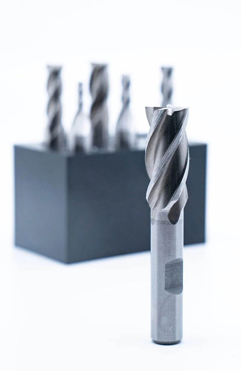 Six-piece set of 4-flute center-cut end mills (1/8–1/2 in) with 3/8 in shank and plastic stand