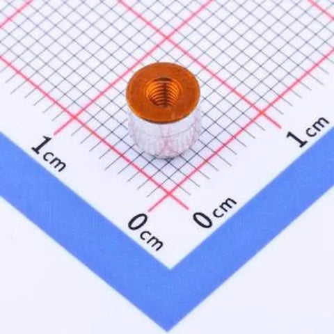 Hella Reliable Twenty Piece SMD Surface Mount Round Nuts For Circuit Board Assembly Copper Tinned Electro Mechanics Standoff Hardware M2.5 By 4.5 mm shown on measurement grid.