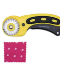 45mm Wavy Rotary Cutter With 10 Piece Pinking Circular Refill Blades For Fabric Paper Leather Crafts Quilting Patchwork Sewing Tool For DIY Makers SKS 7 Stainless Durable Cuts Through 6 Plus Layers with a pink polka dot fabric sample.