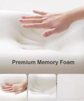 Hand pressing ergonomic headrest pillow with comfy memory foam neck support cushion and removable cover, demonstrating softness.