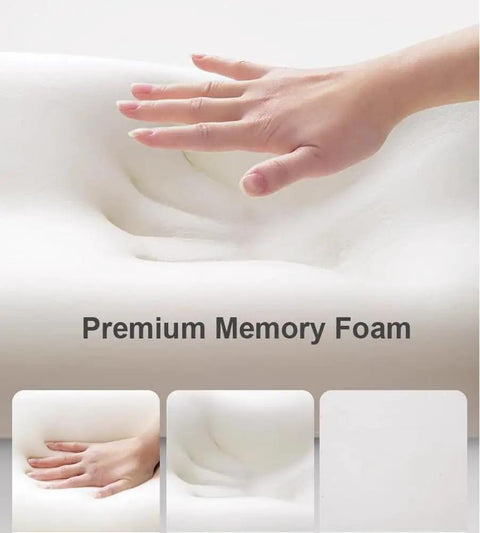 Hand pressing ergonomic headrest pillow with comfy memory foam neck support cushion and removable cover, demonstrating softness.
