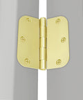 Close-up of polished brass door hinge installed on interior door, 24 Pack Polished Brass Door Hinges For Interior Doors, Three And A Half Inch Square, Five Eighths Radius Corners, Satin Gold Brushed Brass Finish, Heavy Duty Door Hardware Includes 144 Matching Screws.