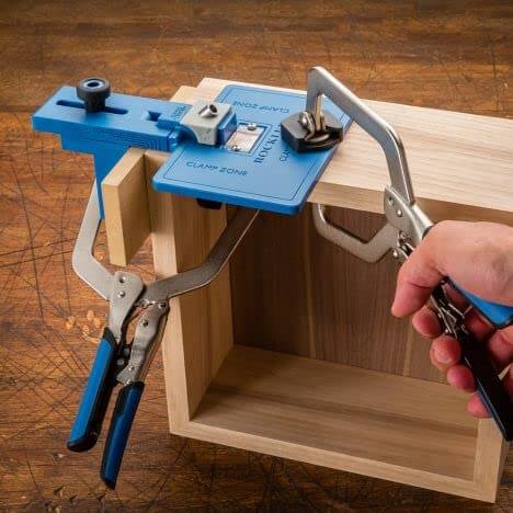 Corner Key Doweling Jig for Decorative Mitered Joints With Molded Reference Lines and Drill Guides, Pro Grade Dowel Tool Kit in use on wood.