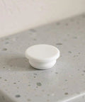 Silicone Bathtub Drain Plug Cover 5pcs for 30-31mm Bubble Openings displayed on a speckled countertop.