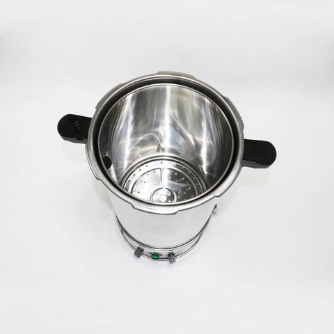 Open-top view of 24L stainless steel lab autoclave chamber with black side handles and perforated steam tray