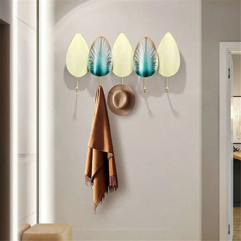 Heavy Duty Iron Wall Mounted Coat Hooks And Scarf Organizer With Sleek Geometric Lines, featuring a brown scarf and hat.