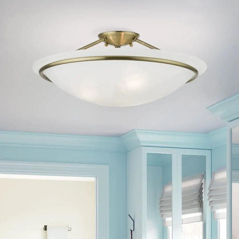 Newburgh 3 Light Ceiling Mount In Bronze, Transitional Style Ceiling Fixture With Steel Construction in a bright room