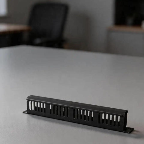 Rock Solid 24 Port Network Patch Panel For 19 Inch Rack Mount With Standard Rj45 Jacks Heavy Duty Cable Management Gear Total Wire Wrangler For Server Rooms And It Closets Black Finish on a table.