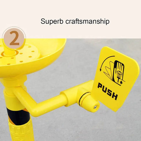 Close-up of yellow push handle on the Stainless Steel 304 Emergency Eyewash Station Floor Mounted With Dual Nozzles.
