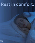 Person sleeping peacefully in a bed with white linens, text overlay says 'Rest in comfort.'