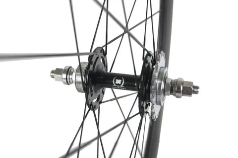 Side view of 50mm Carbon Fiber Track Wheel Set Matte Finish 3K Fixed Gear Wheelset With Cog Built For Speed Junkies And Long Rides