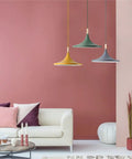 Three Color Barn Pendant Light Set In Nordic Macaron Style With Green Yellow And Smoke Gray Domes in living room setting.