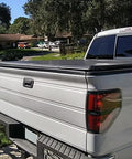 ECOTRIC tailgate molding cap for Ford F-150 (2009-2014), installed on white pickup with tonneau cover