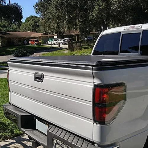 ECOTRIC tailgate molding cap for Ford F-150 (2009-2014), installed on white pickup with tonneau cover