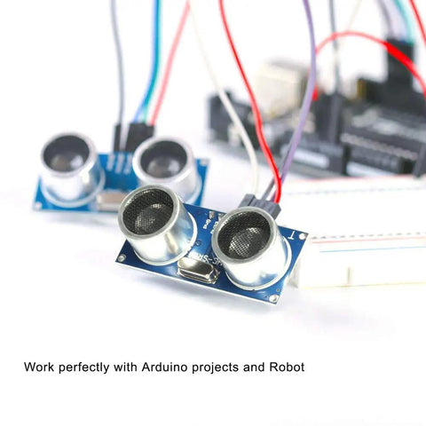 Five Piece Ultrasonic Sensor Blocks Kit With Three Mounting Brackets For DIY Robot Nerds And Raspberry Pi Arduino Mega Duemilanove Projects, showing close-up of connected HC-SR04 module.