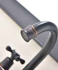 Close-up of oil rubbed bronze bathroom faucet with 2 handles 4 inch centerset vanity sink faucet stainless steel farmhouse deck mount lavatory mixer tap for RV and home