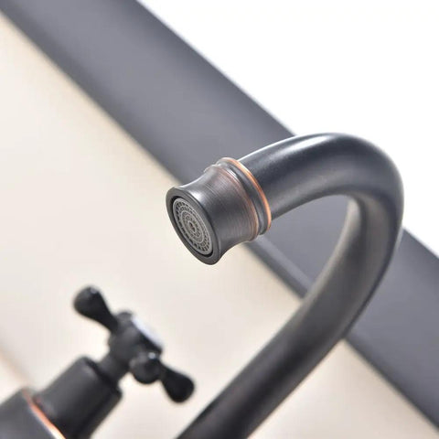 Close-up of oil rubbed bronze bathroom faucet with 2 handles 4 inch centerset vanity sink faucet stainless steel farmhouse deck mount lavatory mixer tap for RV and home