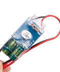 Close-up of Two Pack UBEC 5V 5A External BEC Voltage Regulator showing circuit board with wires for RC servos, FPV quadcopters, and airplanes.