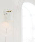Dope Lofty Chic Modern Matte White Wall Sconce With Brass Accent 1 Light Plug-In Or Hardwire Stepless Dimming on white wall