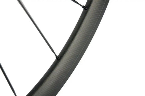 Ultra Light 700C Road Bike Carbon Clincher Wheelset With 38mm Depth For Shimano 8 9 10 11 Speed Cassettes Basalt Brake Surface Toray T700 EN Quality Tested V Brake Wheels 1 Year Warranty close-up of 38mm rim and spokes
