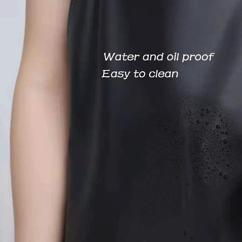 Close-up of Pro Grade Heavy Duty Vinyl Apron Big Ol Extra Large 43 By 29 Inch showing waterproof black vinyl surface.
