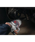 Pro Level One Inch Drive Air Impact Wrench in use, showcasing solid steel core for heavy garage tasks.