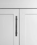 Zinc Alloy Cabinet Pull Handles For Kitchen And Bath on white cabinet, knurled retro design shown in detail from front view