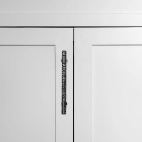 Zinc Alloy Cabinet Pull Handles For Kitchen And Bath on white cabinet, knurled retro design shown in detail from front view