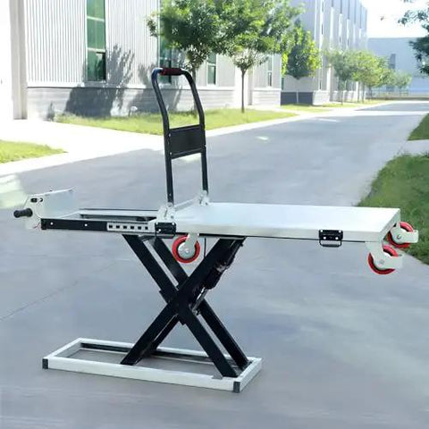 Heavy Duty Electric Scissor Lift Table With 660 Pounds Capacity showcasing foldable frame and retractable platform outdoors.