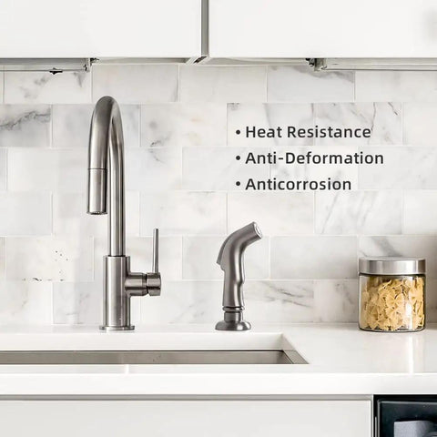 Universal Kitchen Sink Sprayer Replacement With Hose And Holder in brushed nickel on white marble backsplash by sink