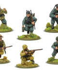 Bolt Action Italian Army and Blackshirts 1 To 56 Scale Tabletop Miniatures Set soldiers posed on grassy terrain