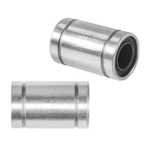 Two silver LM8UU linear bearings with metal housings and 8mm bore